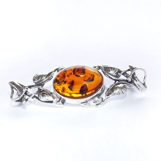 Brooch with amber and antique pattern (925)