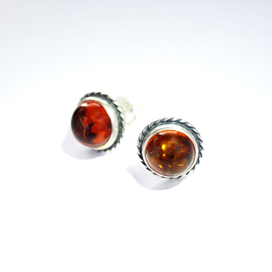 Amber ear studs 11 mm with twisted edge (925)