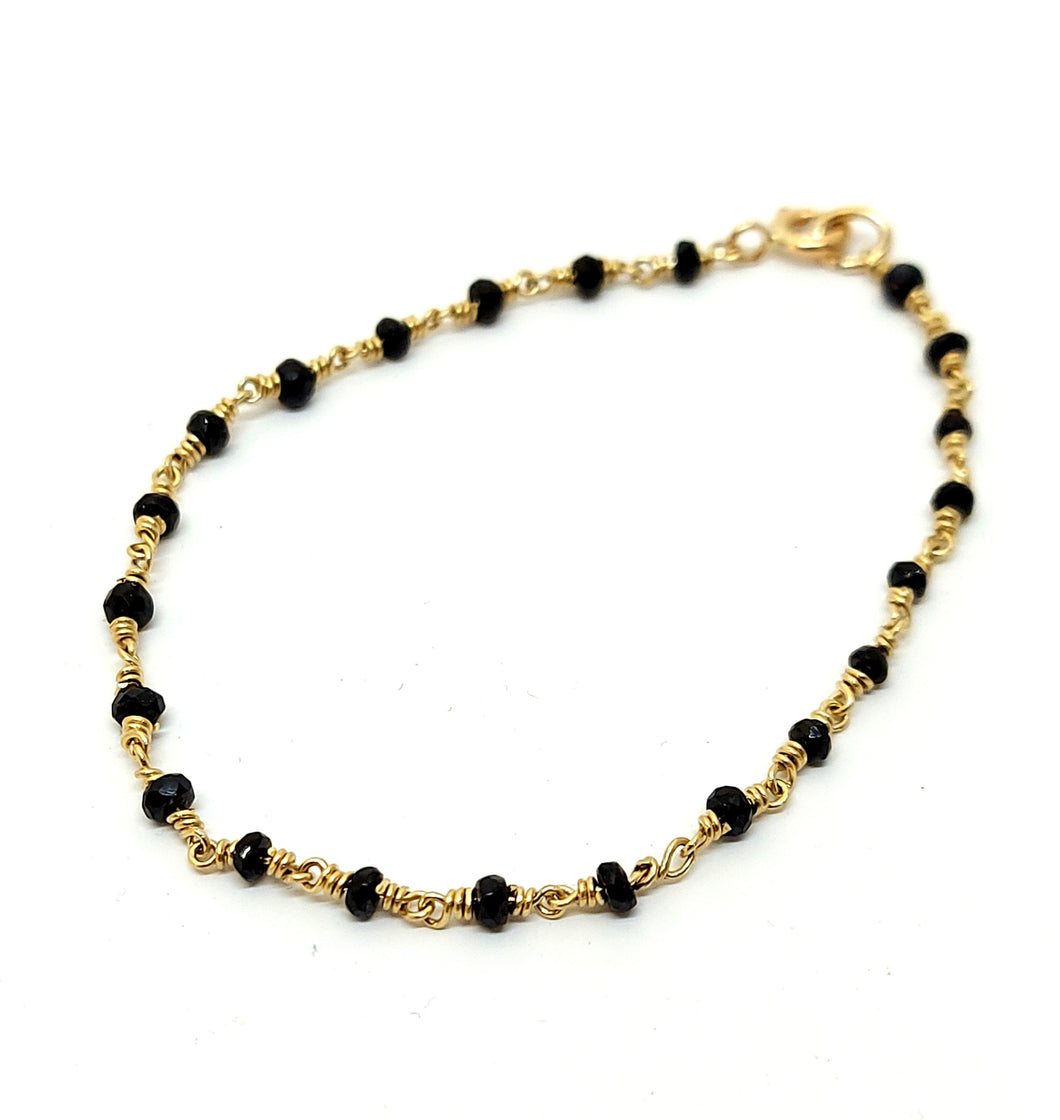 Gold bracelet ByKila, with black sapphire and 14 kt. gold (585)