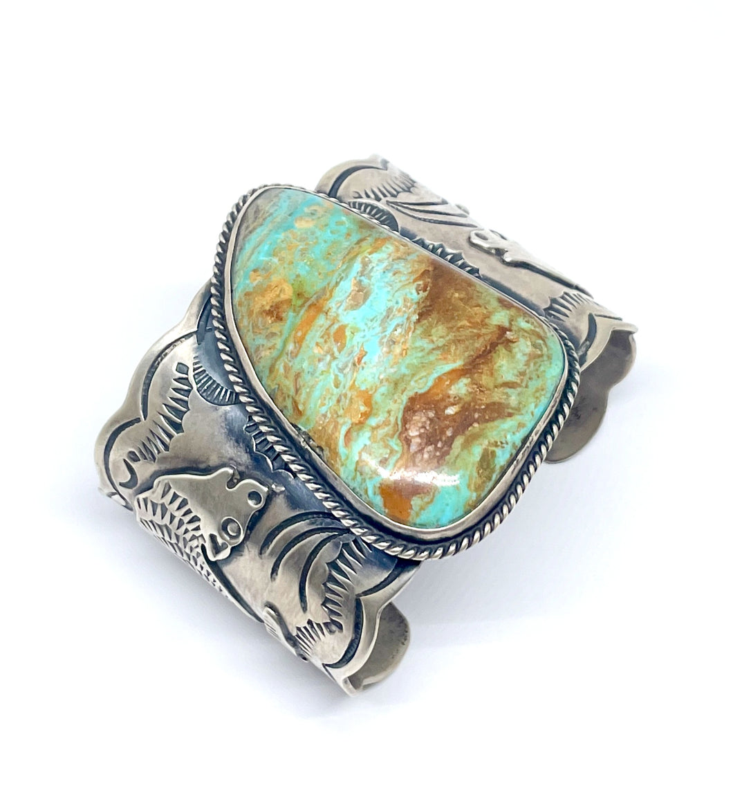 Fixed bangle with 1 large turquoise with wolf motif in oxidized sterling silver (925)